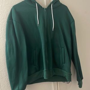 This is a soft cotton zip up sweater